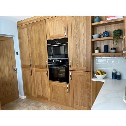 Full height fitted wood kitchen cabinets with built in oven and shelving 500x500