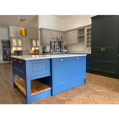 Kitchen showroom display of kitchen cabinets in cerulean blue navy blue and grey 500x500