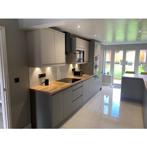Modern style grey fitted kitchen with under cabinet lighting and laminate worktops 500x500